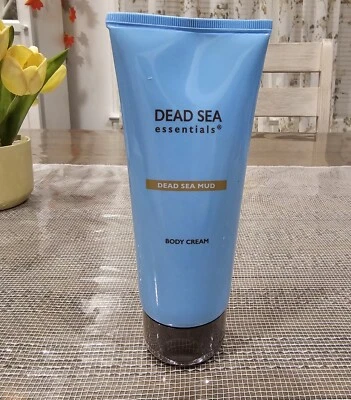 Crema corporal de barro del Mar Muerto Dead Essentials de AHAVA 6,8 fl oz/200 ml Foto 1 de 4
