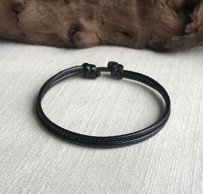 Black 2mm Water Resistant Cord Adjustable Unisex Bracelet or Anklet - Image 1 of 4