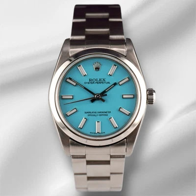 Rolex Oyster Perpetual 31mm Stainless Steel Baby Blue Dial Watch Ref 67480 - Image 1 of 4