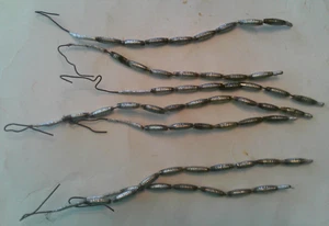 LOT OF 7 VINTAGE SPIKES OF SILVER RIBBED OVAL MERCURY BEADS - Picture 1 of 4