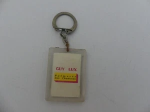 PORTE CLÉ PLASTIQUE TV PALMARES DES CHANSONS GUY LUX - Picture 1 of 2