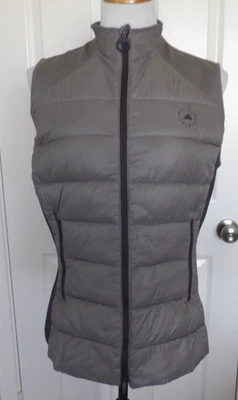 Nuevo con etiquetas Auténtico Chaleco acolchado de golf ADIDAS STELLA MCCARTNEY Gris para mujer Talla Mediana Foto 1 de 4