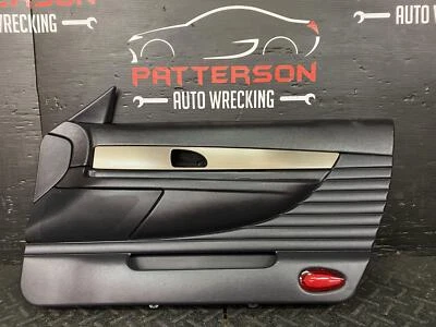 Ford Thunderbird 2004 pasajero delantero interior puerta moldura panel negro bronceado código BQ Foto 1 de 4