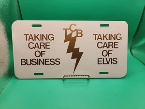 ELVIS PRESLEY TCB ALUMINUM LICENSE PLATE 12" X 6" NOS 1980S - Picture 1 of 6