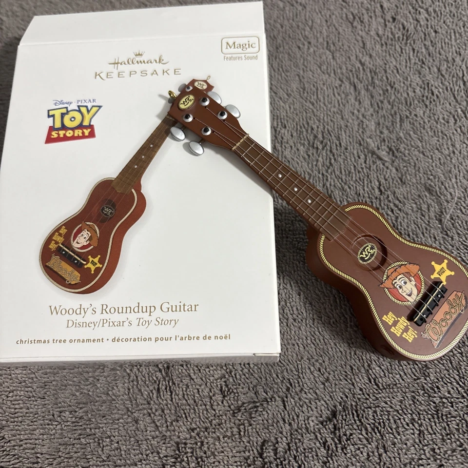 HALLMARK TOY STORY  WOODY'S ROUND UP GUITAR MAGIC CHRISTMAS ORNAMENT 2012 NEW - Image 1 of 2