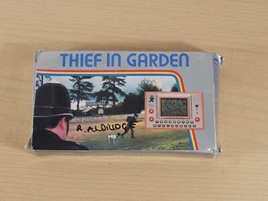 Tronica Thief in Garden 1982 Juego Electrónico De Colección LCD Portátil Raro Funcionando - Imagen 1 de 15