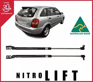 MAZDA 323 (BJ) ASTINA HATCH GAS STRUTS 1998-2004 / OEM QUALITY / NEW PAIR - Bild 1 von 2