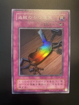 2001 Vintage Yugioh - Seven Tools of the Bandit Super Rare ME-68 - Image 1 of 3