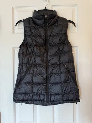 Chaleco chaqueta acolchada negra empacable REI Co-Op para mujer talla pequeña plumón cremallera completa Foto 1 de 4