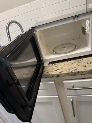 Horno microondas Hamilton Beach 0,9 pies cúbicos 900 W - acero inoxidable (P90D23AL-WR) Foto 1 de 2