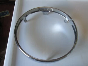 23074-001 OE KAWASAKI HEADLIGHT RIM - Picture 1 of 1