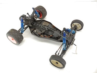 Vintage XTM 1/10 2wd Stadium Truck Roller Rolling Chassis w/ Servo & Tires Used - Image 1 of 4