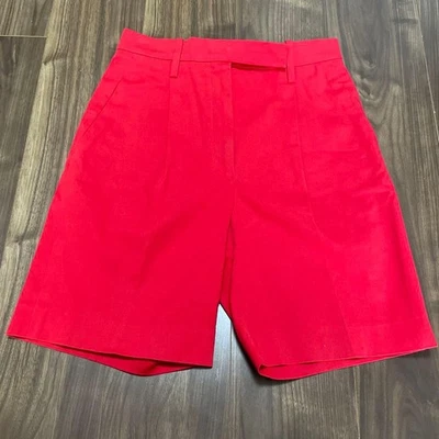 PANTALONES CORTOS HERMES ROJOS USADOS CON BOLSILLOS LATERALES ACEPTABLES Foto 1 de 4