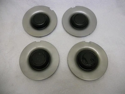 Set of Plymouth Voyager Dodge Caravan center caps 1993-1995 part number 4472515 - Image 1 of 4