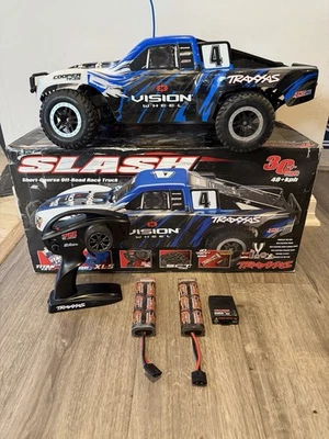 Camión Traxxas Slash TRX 4x2 1/10 58034-1 con 2 baterías (1 trabajo), Adp. Remt. Chrg Foto 1 de 4