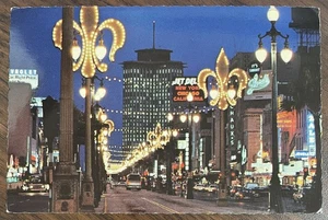 Postcard Canal Street At Night New Orleans Louisiana City of Enchantment - Picture 1 of 2