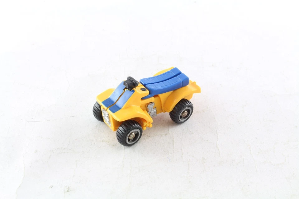 Vintage Zybots Lil gelb Roboter Roller Quad Bike Trafo Spielzeug - Bild 1 von 1