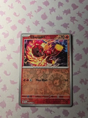 Charcadet 040/198 SV01: Scarlet & Violet Base Set Reverse Holo - Image 1 of 4