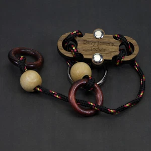 Davy Jones' Locker Black - Ring and Rope Puzzle - Level 7 - Siebenstein Spiele  - Picture 1 of 2