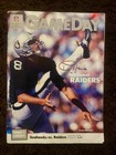 AL DAVIS AND JIM PLUNKETT SIGNED RAIDERS PROGRAM.