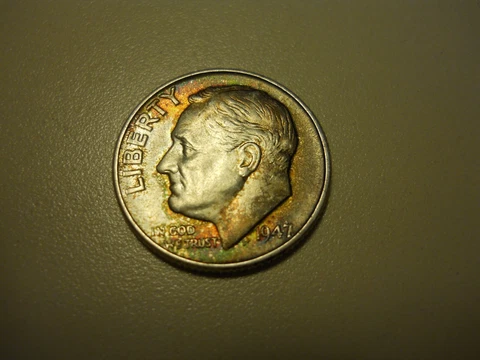 1947-D ROOSEVELT DIME.  TONED. ***** Cover