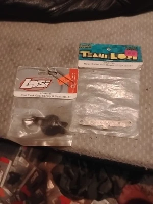 Team Losi LOSA1746 Rear Outer Hinge Pin Brace 8B 8T model , Losa9161 Fuel Cap - Image 1 of 4