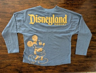 Jersey Disneyland Resort Juvenil XL Spirit Unisex Azul y Dorado  Foto 1 de 4