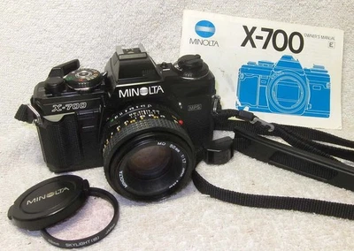 Preciosa cámara SLR de película de 35 mm MINOLTA X-700 MPS con lente de 50 mm f/1,7 y manual Foto 1 de 4