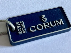 CORUM SWISS WATCH HANG TAG ETICHETTA CARTELLINO - Imagen 1 de 2