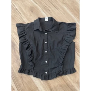 Blusa sin mangas con volantes de colección Partners Please by Malco Modes negra Z1 - Imagen 1 de 6