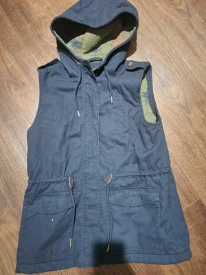 Chaleco acolchado medio azul marino café para damas Y2K bolsillos capucha de piel Foto 1 de 4