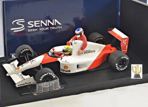 1:18 Minichamps 540911828 McLaren MP4/6, Mexico GP 1991, Senna / Alesi "Taxi" - Bild 1 von 1