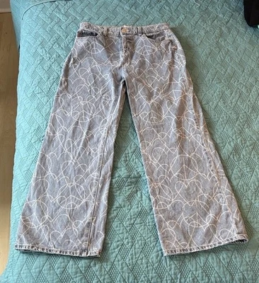 Justice Girls Wide Leg Light Denim Blue Jeans with Heart and Peace Signs - Image 1 of 4