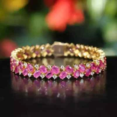 Brazalete para mujer enchapado en oro amarillo de 14 quilates con zafiro rosa creado en laboratorio de corte ovalado de 7,5" Foto 1 de 4