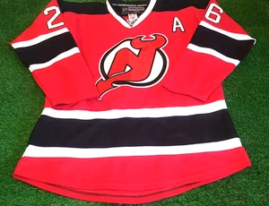 New Jersey Devils Official NHL Home Reebok Shirt Elias #26 (50") - Picture 1 of 8