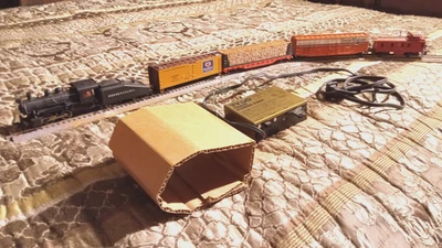 MOTOR HO TRAIN TYCO # 99 0-4-0 CON EXTRAS Foto 1 de 4