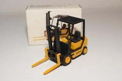 A31 1:25 NZG N.Z.G. 296 CARRELLO ELEVATORE CAPRICORNO GIALLO OTTIMO IMBALLATO - Immagine 1 di 4
