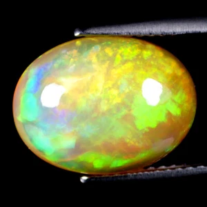4.92 ct Oval Cabochon Cut (14 x 11 mm) Ethiopia Play of Colors Rainbow Opal - Picture 1 of 1
