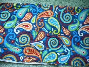 Bright colored paisley pattern on dark blue background - Picture 1 of 1