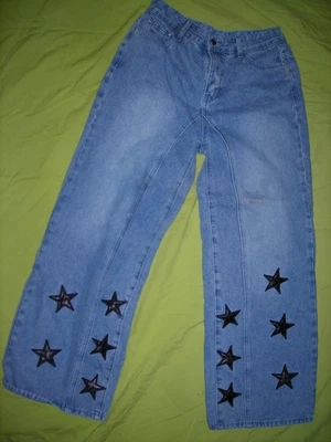 Jeans azules con estrellas de cuero negro 31 pulgadas cintura 29 largo talla M con paneles de pierna Foto 1 de 3