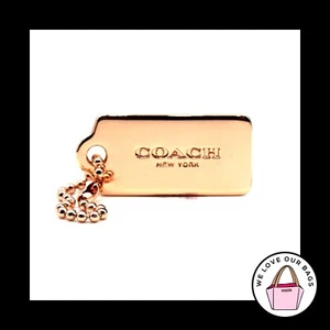 New Small 1.25" COACH NEW YORK Rose Gold Metal Fob Bag Charm Keychain Hang Tag - Picture 1 of 1