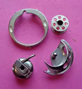 4 Stück Original-Zubehör-Hersteller Shuttle Haken, Spulenkoffer, Spule, Race Cover Ring Singer 2263 + F3.2 - Bild 1 von 8