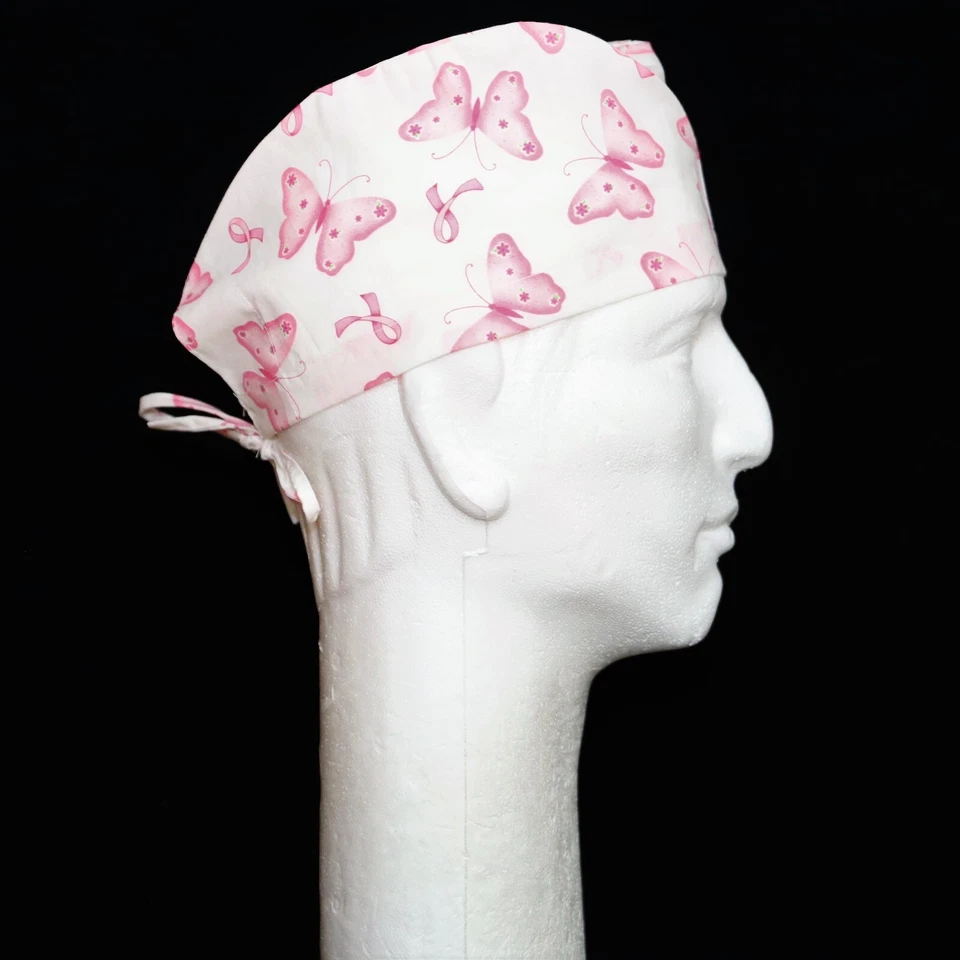 Concientización sobre el cáncer de mama cinta rosa tema mariposa en sombrero blanco Foto 1 de 1