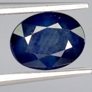 Piedra preciosa Madagascar de zafiro azul rico con tapa natural de corte ovalado de 1,39 quilates 7x5 mm - Imagen 1 de 14