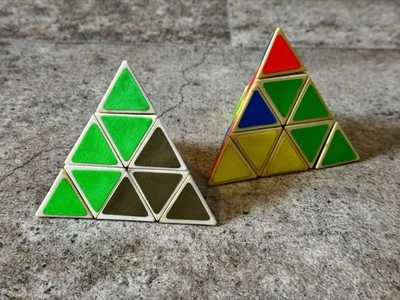 Two Vintage 1981 Tomy Pyraminx Pyramid Triangle Rubiks Cube Puzzle - Image 1 of 4