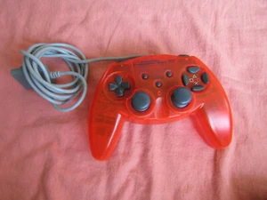 CONTROLADOR ANALÓGICO NARANJA TRANSPARENTE SIN MARCA PLUS DOBLE SACUDIDA PARA PS1 - Imagen 1 de 5