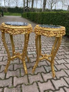 French Louis XVI Pedestal Side Tables in Gold  With Black Marble Top - a Pair