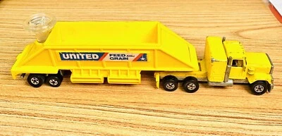 Plataformas de dirección Hot Wheels GMC "United Feed & Grain" de colección (amarillo) - 1980 (HK) Foto 1 de 4