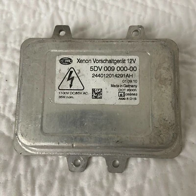 Lastro de farol CADILLAC ESCALADE ESV XENÔNIO HELLA 5DV009000-00 2007 - 2014 FABRICANTE DE EQUIPAMENTO ORIGINAL - Imagem 1 de 4