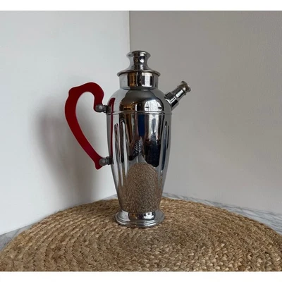 Jarra de cóctel antigua/vintage Art Deco cromada con mango de baquelita roja  Foto 1 de 4